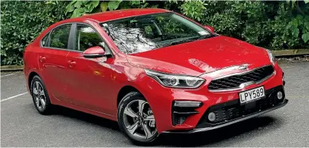  ?? PHOTOS: DAMIEN O’CARROLL/STUFF ?? Kia has popped a few vents and intakes on the new Cerato to remind you they also make the Stinger.