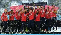  ?? — AAP ?? England’s Jos Buttler holds aloft the 2022 T20 World Cup trophy.