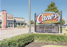  ?? JHVEPhoto/Getty Images ?? Above, Raising Cane’s, a Louisiana-based fast-food chain, is expected to open two locations — in Enfield and Simsbury — in Connecticu­t in 2024.