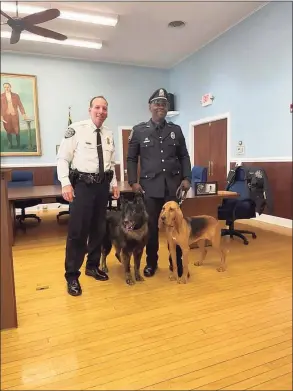  ?? New Milford Police Department / Contribute­d photo ?? Chief Spencer Cerruto with retiring K-9 Drake, officer Mark Williams and the police department’s newest member, K9 Ella, during the retirement ceremony for K-9 Drake.