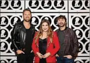  ?? BRETT CARLSEN/ST.
JUDE CHILDREN’S RESEARCH HOSPITAL/GETTY IMAGES/TNS ?? Charles Kelley (left), Hillary Scott and Dave Haywood of Lady A on Jan. 17 in Memphis, Tennessee.