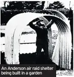  ??  ?? An Anderson air raid shelter being built in a garden