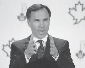  ?? Finance Minister Bill Morneau’s Liberals are contemplat­ing tax system changes, and Andrew Coyne writes it may be time to consider “a broader reform” of the system. ?? FRANK GUNN / THE CANADIAN PRESS FILES