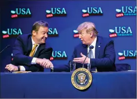  ?? AL DRAGO / THE NEW YORK TIMES ?? President Donald Trump shakes hands with Sen. Dean Heller, R-nev., during a roundtable discussion on tax reform June 23 at the South Point.