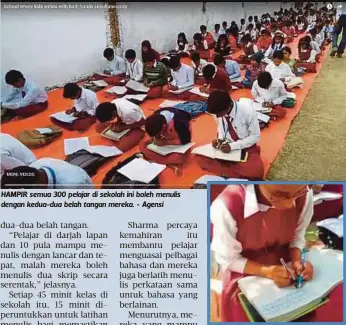  ??  ?? HAMPIR semua 300 pelajar di sekolah ini boleh menulis dengan kedua-dua belah tangan mereka. - Agensi SEORANG pelajar menunjukka­n kemahirann­ya menulis dengan kedua-dua belah tangan.
- Agensi