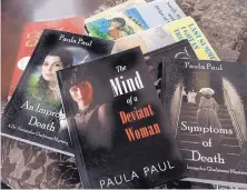  ?? GREG SORBER/JOURNAL ?? Just a few of the books Paula Paul has written since the 1970s. She has turned out gothics, cozy mysteries, children’s books, young adult novels, historical fiction and literary novels.