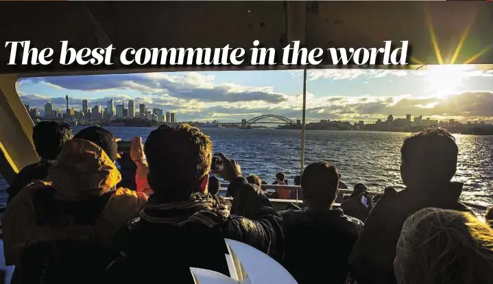  ?? Reuters ?? City’s lifeblood Above: Tourists take pictures of the afternoon sun as they return to Circular Quay from a day trip to the seaside in Manly. Sydney’s ferry system has been its lifeblood since the mid 1800.