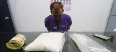  ?? FERDINAND EDRALIN ?? Jonathan Cañada was caught with P7 million worth of illegal drugs during a buy-bust operation in his house on Tres de Abril Street, Barangay Labangon, Cebu City yesterday afternoon. He allegedly gets his supply from druglords operating from inside the...