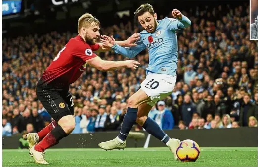  ?? — AFP ?? Doubtful: Manchester City’s Bernardo Silva (right) left the Portuguese national squad this week carrying an unspecifie­d injury. Inset: Pep Guardiola.