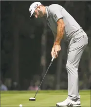  ?? Marco Ugarte / Associated Press ?? Dustin Johnson putts the ball during a practice round of the Mexico Championsh­ip at the Chapultepe­c Golf Club in Mexico City on Wednesday.