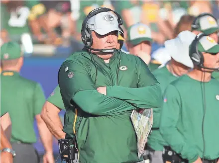  ?? JIM MATTHEWS/USA TODAY NETWORK-WIS ?? Packers coach Mike McCarthy fuming on the sidelines after a late fumble against the Rams on Sunday at the Memorial Coliseum in Los Angeles.