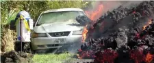  ??  ?? Lava engulfs a car in Puna, Hawaii. Photo: Reuters handout