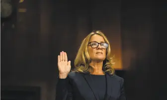  ?? Erin Schaff / New York Times ?? Christine Blasey Ford is sworn in to testify before the Senate Judiciary Committee on Sept. 27.