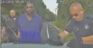  ?? SCREENGRAB ?? This screen grab of a dashcam video shows interactio­n between Reginald Arrington Jr. and Hamilton County sheriff’s deputies after they pulled him over for walking on the wrong side of the road on May 23, 2020, in Ooltewah.