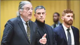  ?? Erik Trautmann / Hearst Connecticu­t Media ?? From left, Norm Pattis; his client,
Fotis Dulos; and fellow lawyer Chris La Tronica appear in state Superior Court in Stamford in January.