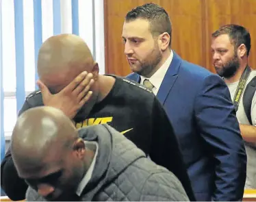  ?? Picture EUGENE COETZEE ?? TRIAL CONTINUES: Sinethemba Nemembe, Zolani Sibeko and Christophe­r Panayiotou enter the dock