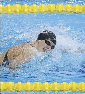  ?? LAURENCE GRIFFITHS/GETTY IMAGES ?? Katie Ledecky competes during the women’s 400-metre freestyle final during the FINA world championsh­ips on Sunday in Budapest, Hungary. Ledecky won gold in the event.