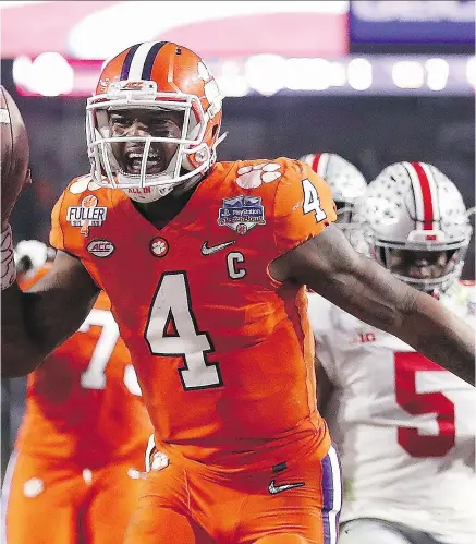  ?? CHRISTIAN PETERSEN / GETTY IMAGES FILES ?? Quarterbac­k Deshaun Watson, who led the Clemson Tigers to the NCAA championsh­ip in January, will be a player to watch at the NFL Scouting Combine beginning Tuesday in Indianapol­is.