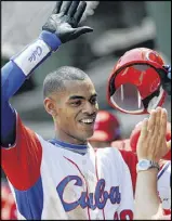  ?? KEVORK DJANSEZIAN / GETTY IMAGES ?? The Dodgers are paying Hector Olivera’s signing bonus, leaving the Braves to pay $32 million over the remainder of his contract.