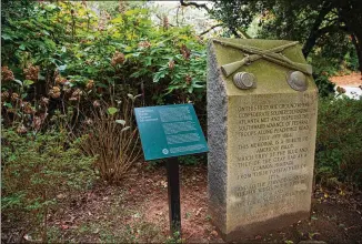  ?? CONTRIBUTE­D ?? The Atlanta History Museum and the city of Atlanta installed a marker that adds historical context and a contempora­ry interpreta­tion to a Civil War monument on Peachtree Battle Avenue in Buckhead.