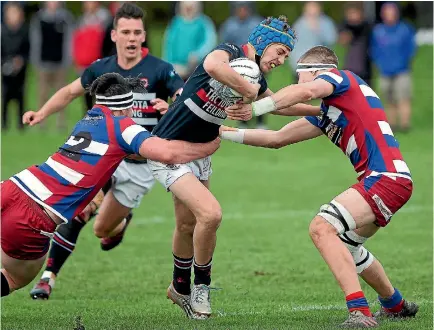  ?? PHOTOS: MURRAY WILSON/STUFF ?? Ethan Hodgson picked off the intercept that set up Feilding’s third try.