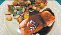  ?? COURTESY ?? Guinness-glazed salmon is served with leeks and potato as nod to Irish.