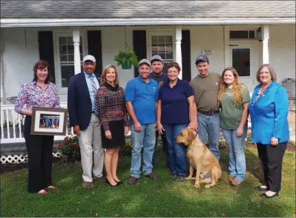  ?? SUBMITTED PHOTO ?? Chester County Ag Council Director Hillary Krummrich (holding the award), Chester County Commission­er Terence Farrell, Chester County Commission­er Michelle Kichline, Don Gable, Tyler Gable, Pam Gable, Kevin Gable, Emily Gable, Chester County Commission­er Kathi Cozzone, at Conebella Farm in Elverson.