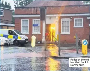  ??  ?? Police at the old NatWest bank in Northenden