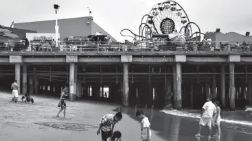  ?? Tribune News Service ?? ■ A man's body was discovered Thursday below the Santa Monica Pier, pictured above in 2015.