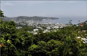  ?? ORVIL SAMUEL — THE ASSOCIATED PRESS ?? A cruise ship sits docked waiting for passengers to be evacuated April 9in Kingstown, on the eastern Caribbean island of St. Vincent due to the eruption of La Soufriere volcano.