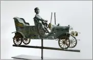  ?? ADAM REICH — AMERICAN FOLK ART MUSEUM VIA AP ?? This image provided by the American Folk Art Museum shows a Touring Car and Driver weather vane.