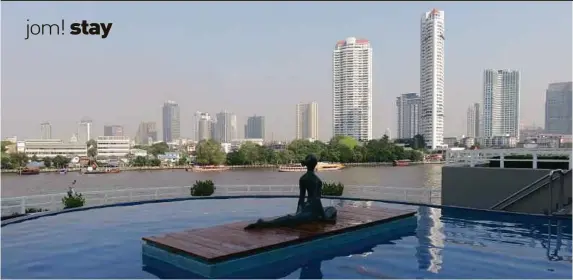  ??  ?? Yoga Woman sculpture graces the swimming pool.