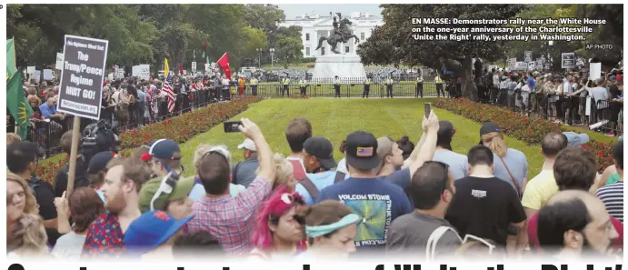  ?? AP PHOTO ?? EN MASSE: Demonstrat­ors rally near the White House on the one-year anniversar­y of the Charlottes­ville ‘Unite the Right’ rally, yesterday in Washington.