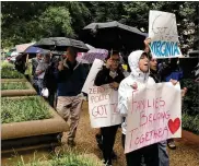  ?? JUSTIN WM. MOYER / WASHINGTON POST ?? In Washington, D.C. on Saturday, protesters rallied outside the Justice Department against family separation­s at the border, one of several to be held across the Washington region.