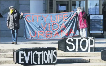  ?? MICHAEL DWYER — THE ASSOCIATED PRESS FILE ?? Tenants’ rights advocates demonstrat­e in front of the Edward W. Brooke Courthouse in Boston on Jan. 13. The Biden administra­tion is extending a federal moratorium on evictions of tenants who’ve fallen behind on rent during the coronaviru­s pandemic. The Centers for Disease Control and Prevention on March 29 moved to continue the pandemic-related protection, which had been scheduled to expire on April 1.