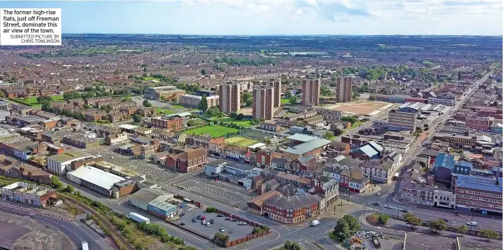  ?? SUBMITTED PICTURE BY
CHRIS TOMLINSON ?? The former high-rise flats, just off Freeman Street, dominate this air view of the town.