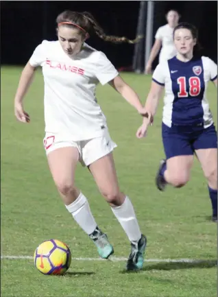  ?? MIKE BUSH/NEWS-SENTINEL ?? Lodi forward Ashley Thorpe (20) ball keeps moving the soccer ball against Pleasant Grove in Wednesday's non-league girls soccer game.