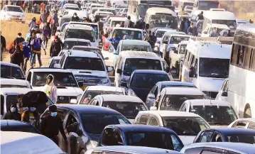  ??  ?? Motorists were on Tuesday stranded at Hunyani River bridge along Seke road