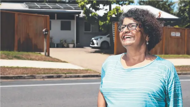  ?? Picture: BRENDAN RADKE ?? SUNNY SMILE: Adelene D'Silva has enjoyed great savings on her power bills since installing solar panels at her Mooroobool home.