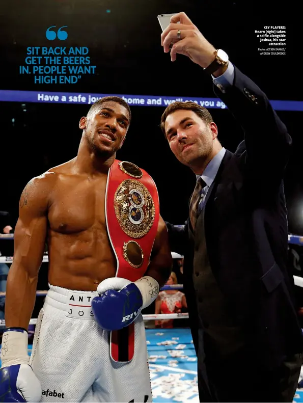  ?? Photo: ACTION IMAGES/ ANDREW COULDRIDGE ?? KEY PLAYERS: Hearn [right] takes a selfie alongside Joshua, his star attraction