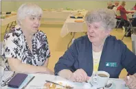  ?? JEREMY FRASER/CAPE BRETON POST ?? Dora Matthews, left, and Betty Hillier talk prior to the start of the Cape Breton Council for Seniors and Pensioners meeting at the North Sydney Seniors and Pensioners Club on Wednesday. The guest speaker for the meeting was Nova Scotia Deputy Minister...