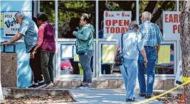  ?? William Luther/staff photograph­er ?? Voters line up at Brook Hollow Library last week on the first day of early voting in the Democratic and Republican primaries. Early voting is coming to an end.