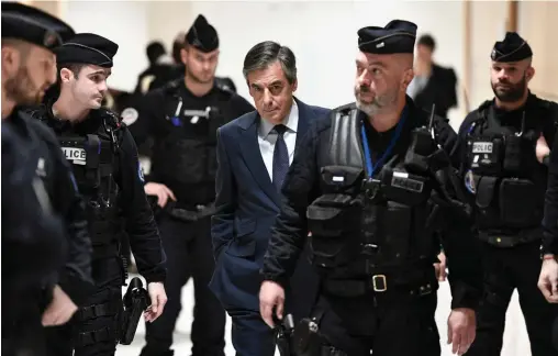  ??  ?? Procès. François Fillon au tribunal, le 27 février 2020. Il n’a fallu qu’un mois à Éliane Houlette, qui dit avoir subi des « pressions », pour ouvrir, en février 2017, une informatio­n judiciaire après les révélation­s du « Canard enchaîné » visant le couple Fillon.