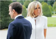  ?? MICHEL EULER / AFP / GETTY IMAGES ?? Emmanuel Macron dropped the idea of creating a special budget for wife Brigitte Macron after a petition opposing it quickly secured more than 280,000 signatures.