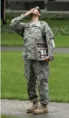  ?? AFP ?? An army man blows a kiss skywards in memory of his late friend Ruben Correa, a firefighte­r who died in the 9/11 attacks in New York City. —