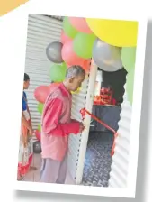  ?? Picture: MATILDA SIMMONS ?? Pon Sami cuts the ribbon to his new home.