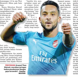  ??  ?? PENYERANG Arsenal Theo Walcott, meraikan jaringan kedua pasukannya dengan gaya tersendiri.