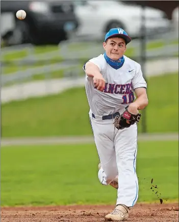  ?? DANA JENSEN/THE DAY ?? Waterford shortstop Will Rocchetti makes a throw to first base during Saturday’s game against East Lyme.