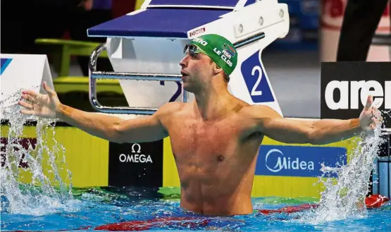  ?? — AFP ?? I can fly: Chad Le Clos of South Africa reacts after winning the 100m butterfly final in a world record time of 48.08 in the Short Course Swimming World Championsh­ips in Windsor, Montreal on Thursday.