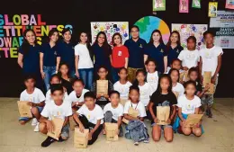  ??  ?? (L-R) SIA Team with Bantay Bata Program Director Jing Castan~eda, and Singapore Airlines scholars of Bantay Bata